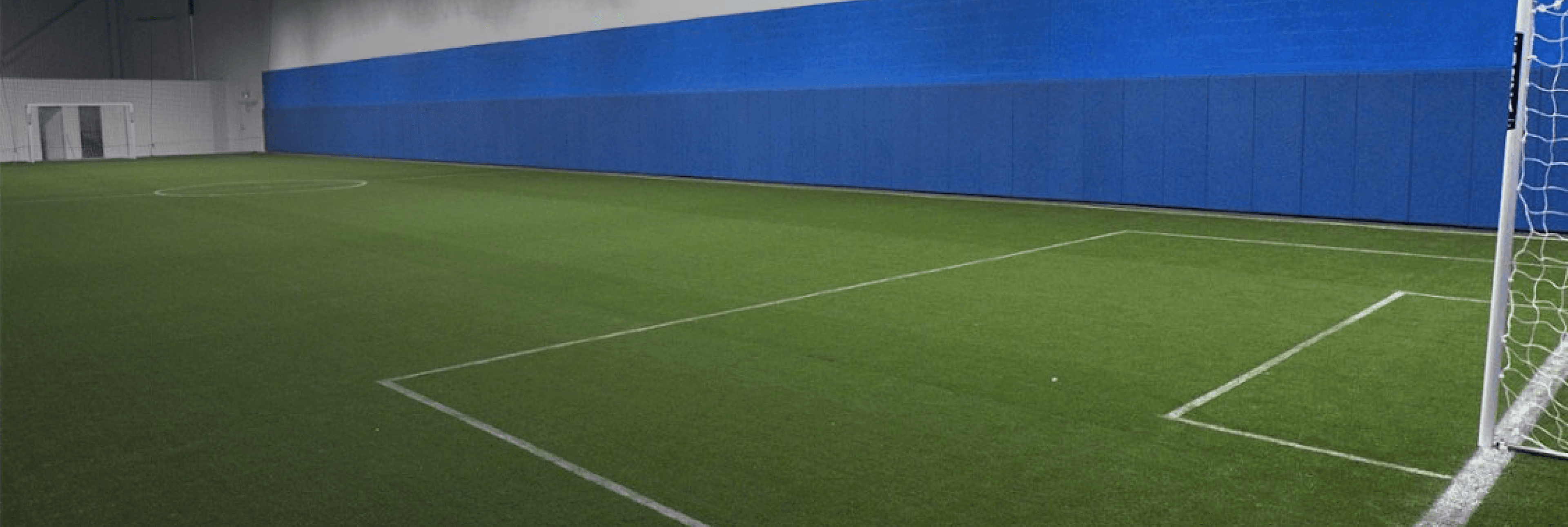 Kids playing on indoor turf
